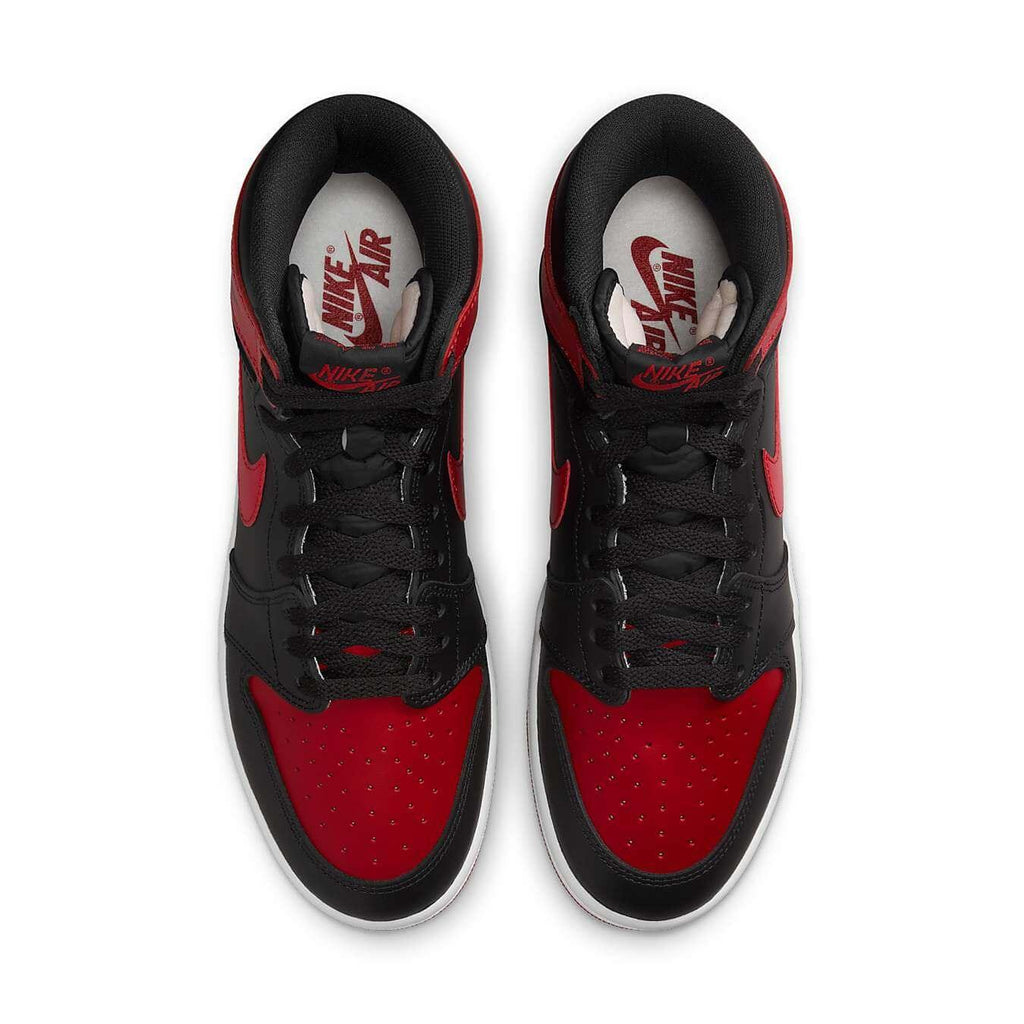 Top view of the Jordan 1 Retro High '85 OG Bred (2025) sneakers in black and red colorway with Nike Air branding.