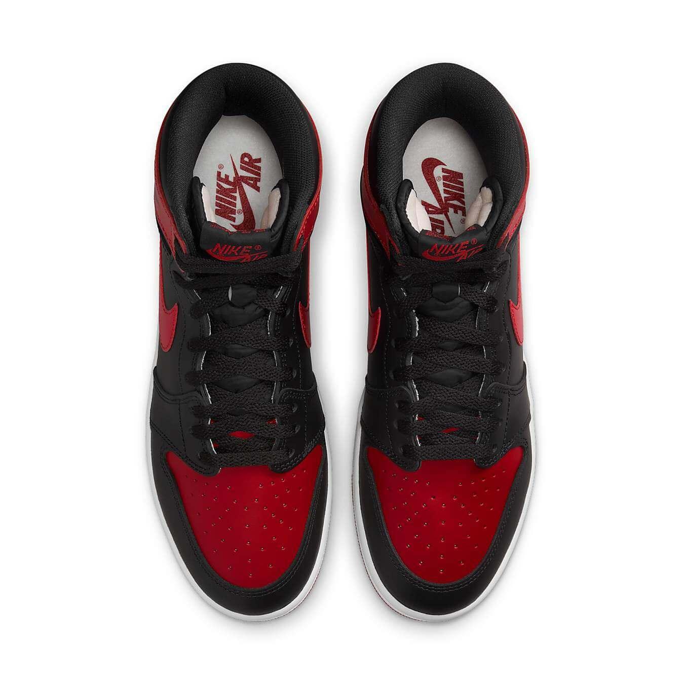Top view of the Jordan 1 Retro High '85 OG Bred (2025) sneakers in black and red colorway with Nike Air branding.