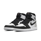 Air Jordan 1 Retro High OG Stage Haze sneakers in black, white, and grey suede detailing.