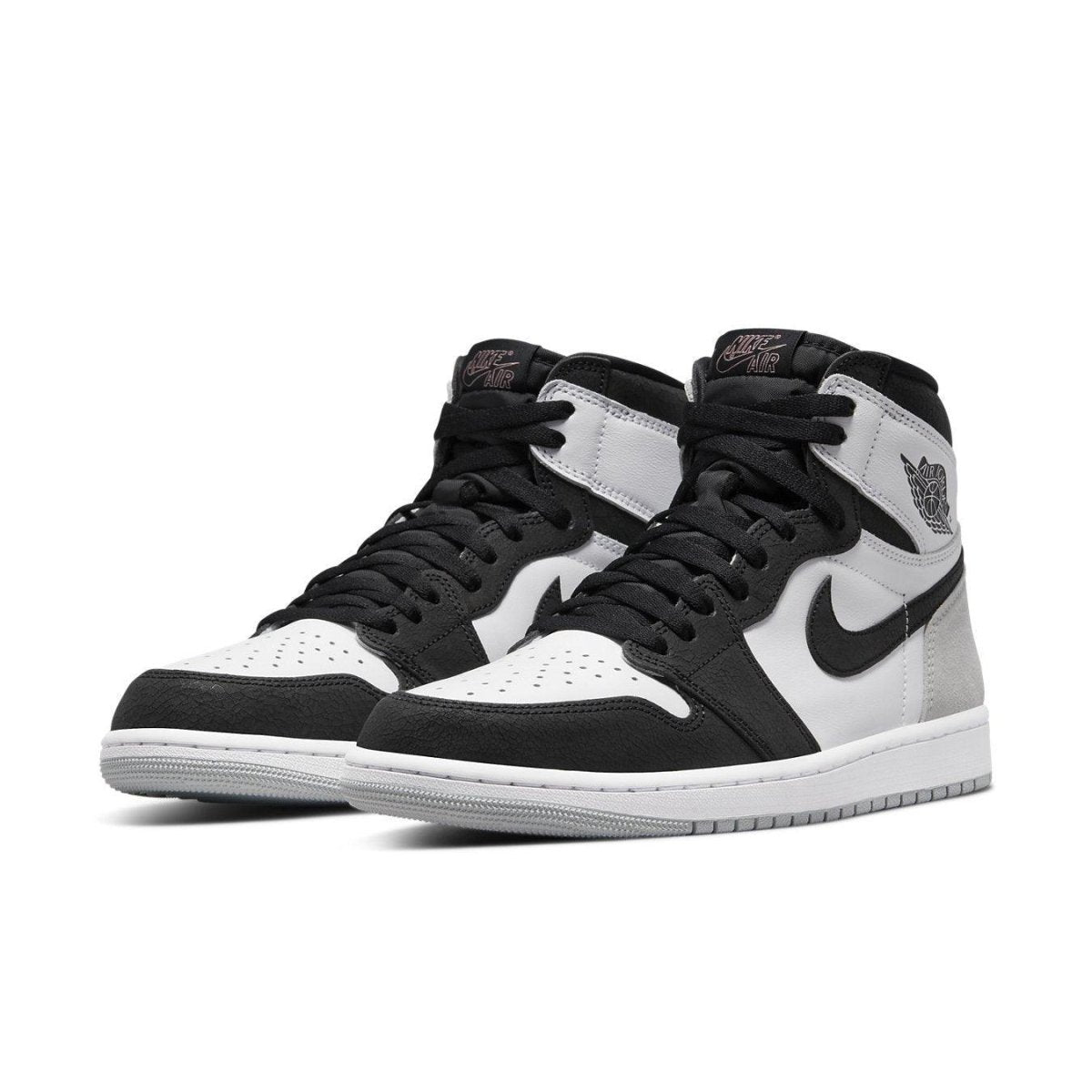Air Jordan 1 Retro High OG Stage Haze sneakers in black, white, and grey suede detailing.
