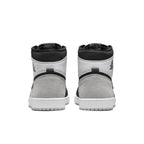 Rear view of Air Jordan 1 Retro High OG Stage Haze showcasing gray suede and black leather accents.
