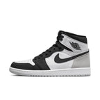 Air Jordan 1 Retro High OG Stage Haze sneaker featuring black, white, and grey colorway with classic design.