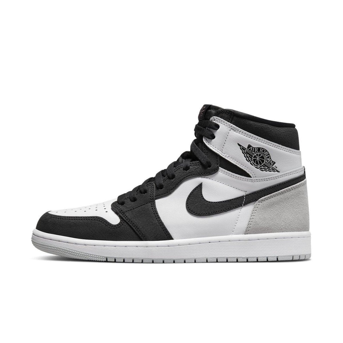 Air Jordan 1 Retro High OG Stage Haze sneaker featuring black, white, and grey colorway with classic design.