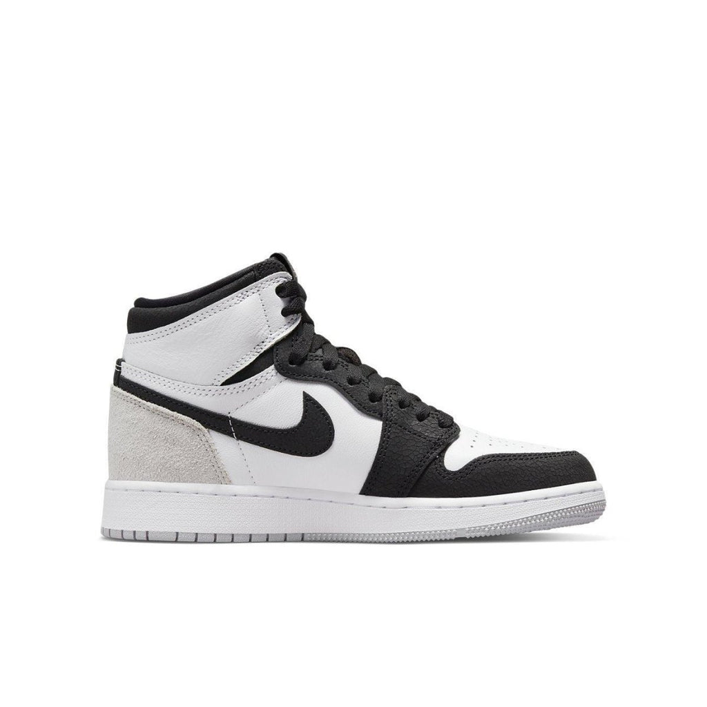 Jordan 1 Retro High Stage Haze (GS) in white, black, fog gray, and bleached coral with suede details.