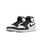 Air Jordan 1 Retro High Stage Haze (GS) in black, white, and grey with coral accents.
