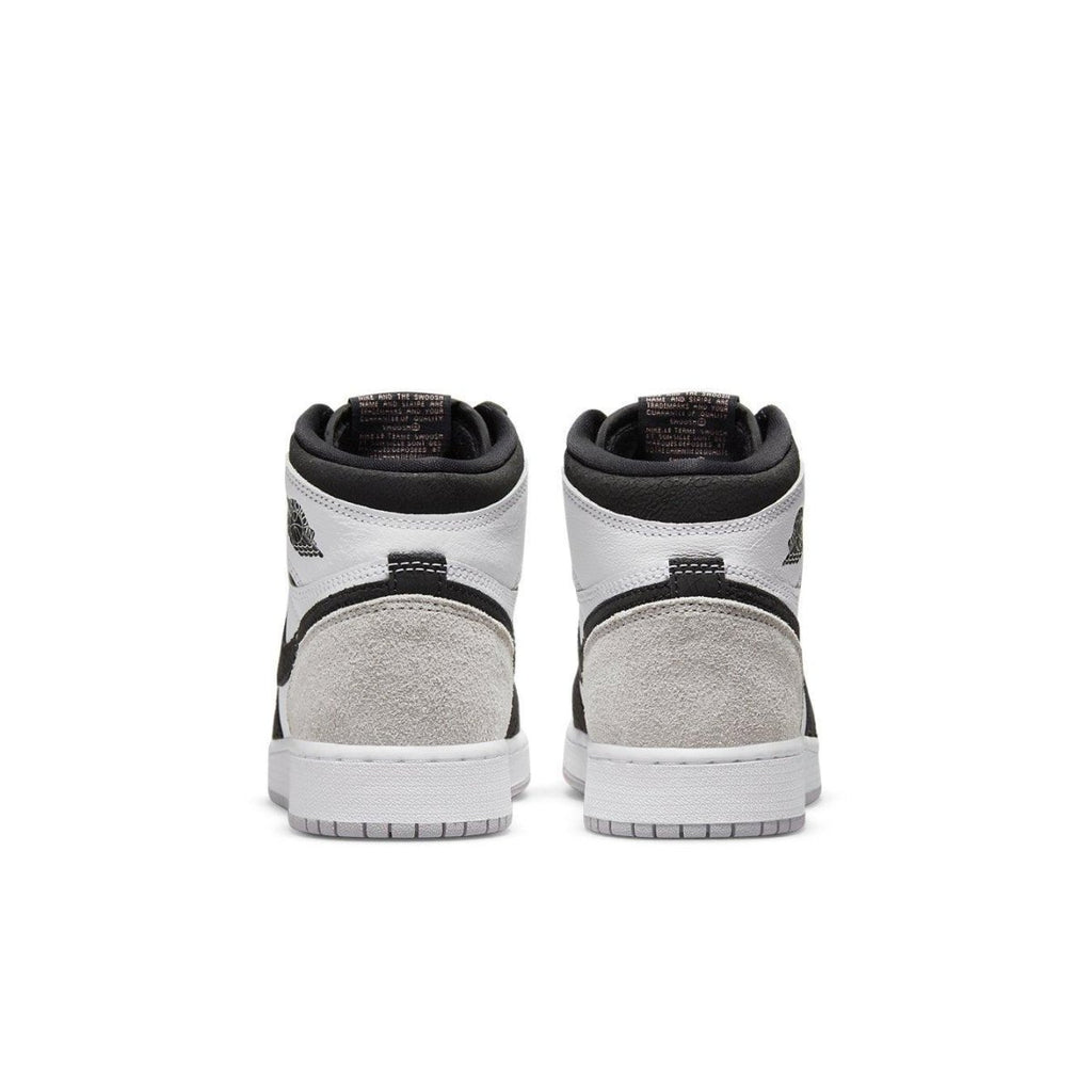 Jordan 1 Retro High Stage Haze (GS) back view featuring white, black, and gray suede accents.