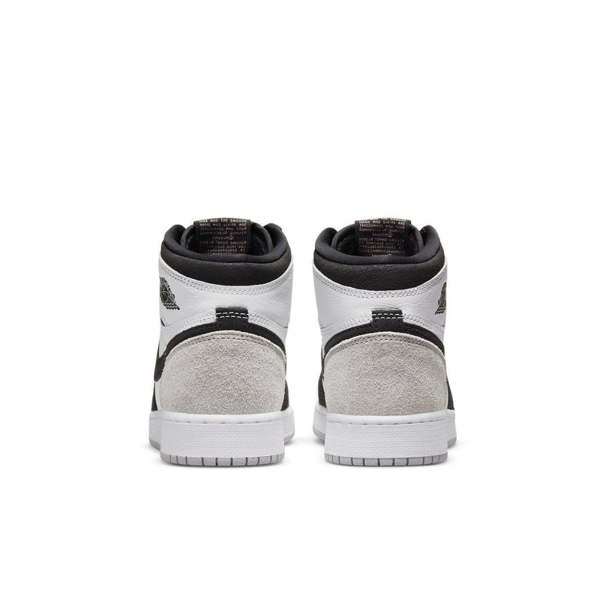 Jordan 1 Retro High Stage Haze (GS) back view featuring white, black, and gray suede accents.