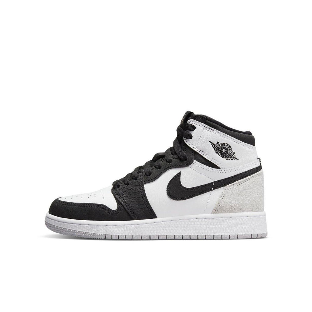 Jordan 1 Retro High Stage Haze (GS) in white, black, grey, and coral with suede details.