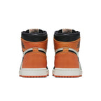 Rear view of Air Jordan 1 Retro Shattered Backboard sneakers featuring orange, black, and white colorway.