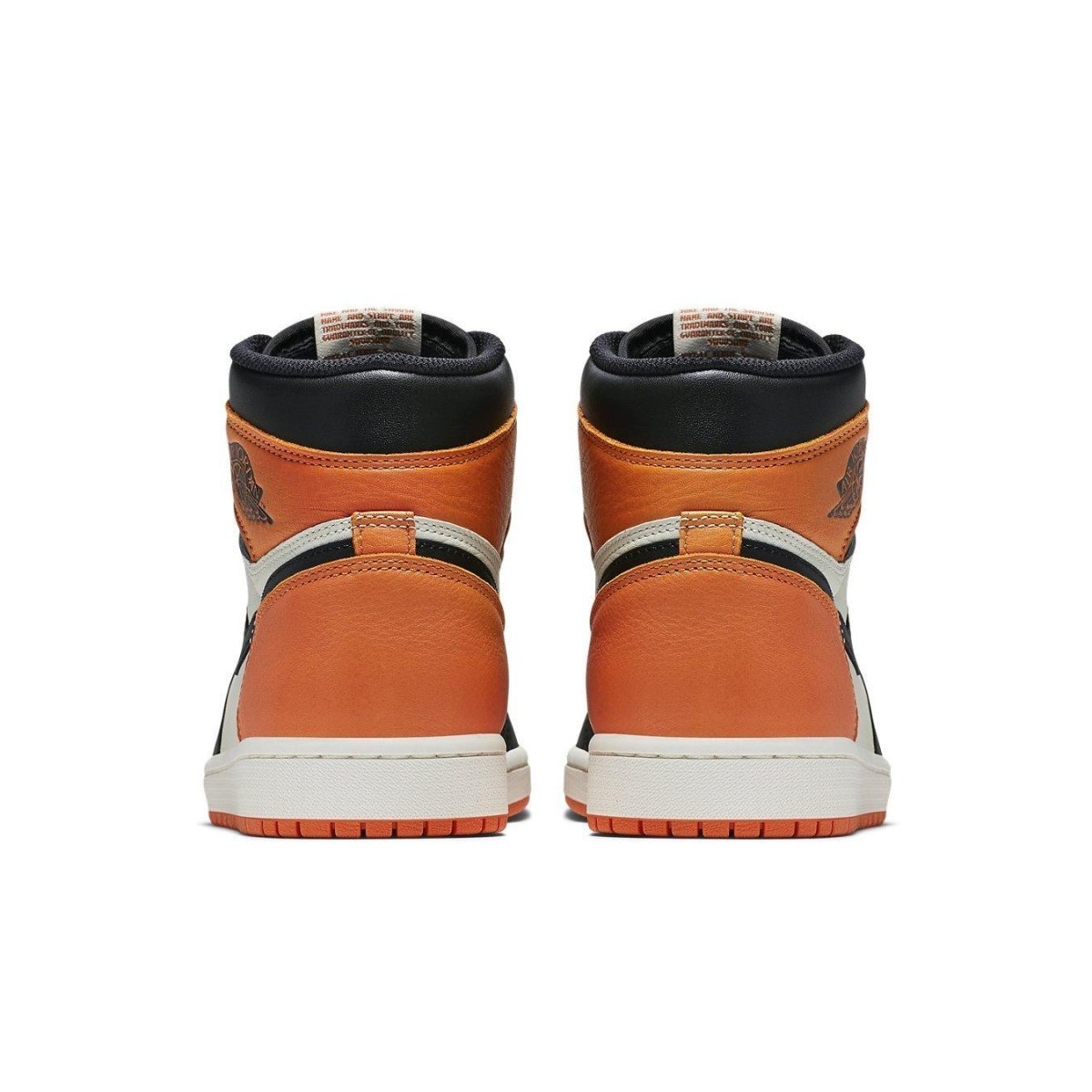 Rear view of Air Jordan 1 Retro Shattered Backboard sneakers featuring orange, black, and white colorway.