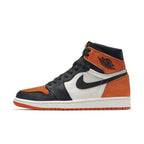 Air Jordan 1 Retro Shattered Backboard sneaker in orange, black, and white colorway, inspired by Michael Jordan's 1985 performance.