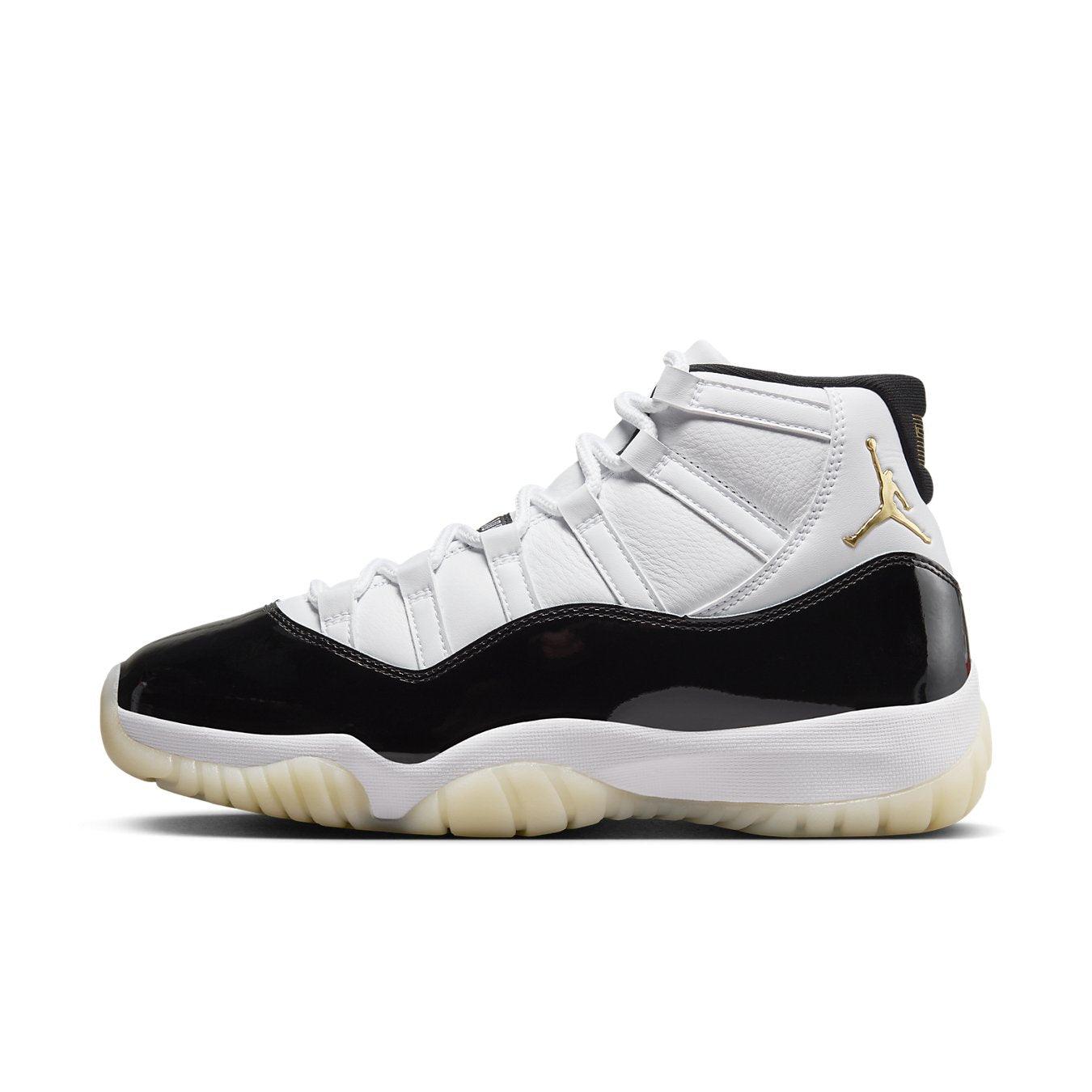Jordan 11 Retro DMP Gratitude 2023 classic sneaker featuring black and white leather design with gold accents.