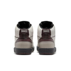 Back view of Jordan 2 Retro A Ma Maniére 'Airness' featuring textured leather and burgundy accents.