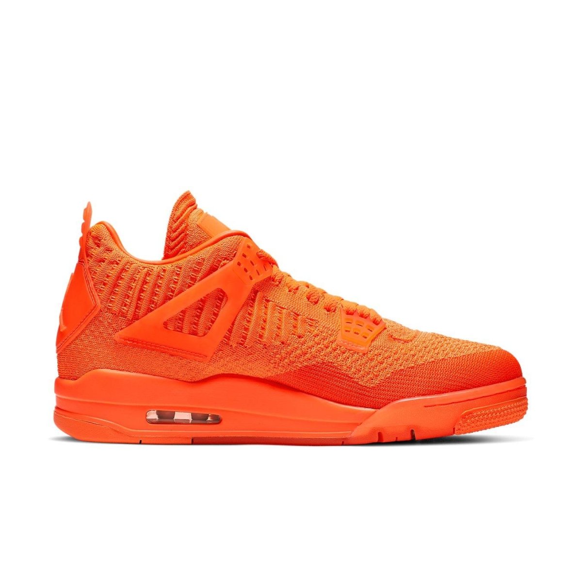 Jordan 4 Retro Flyknit in vibrant Total Orange, showcasing innovative design and Flyknit upper.