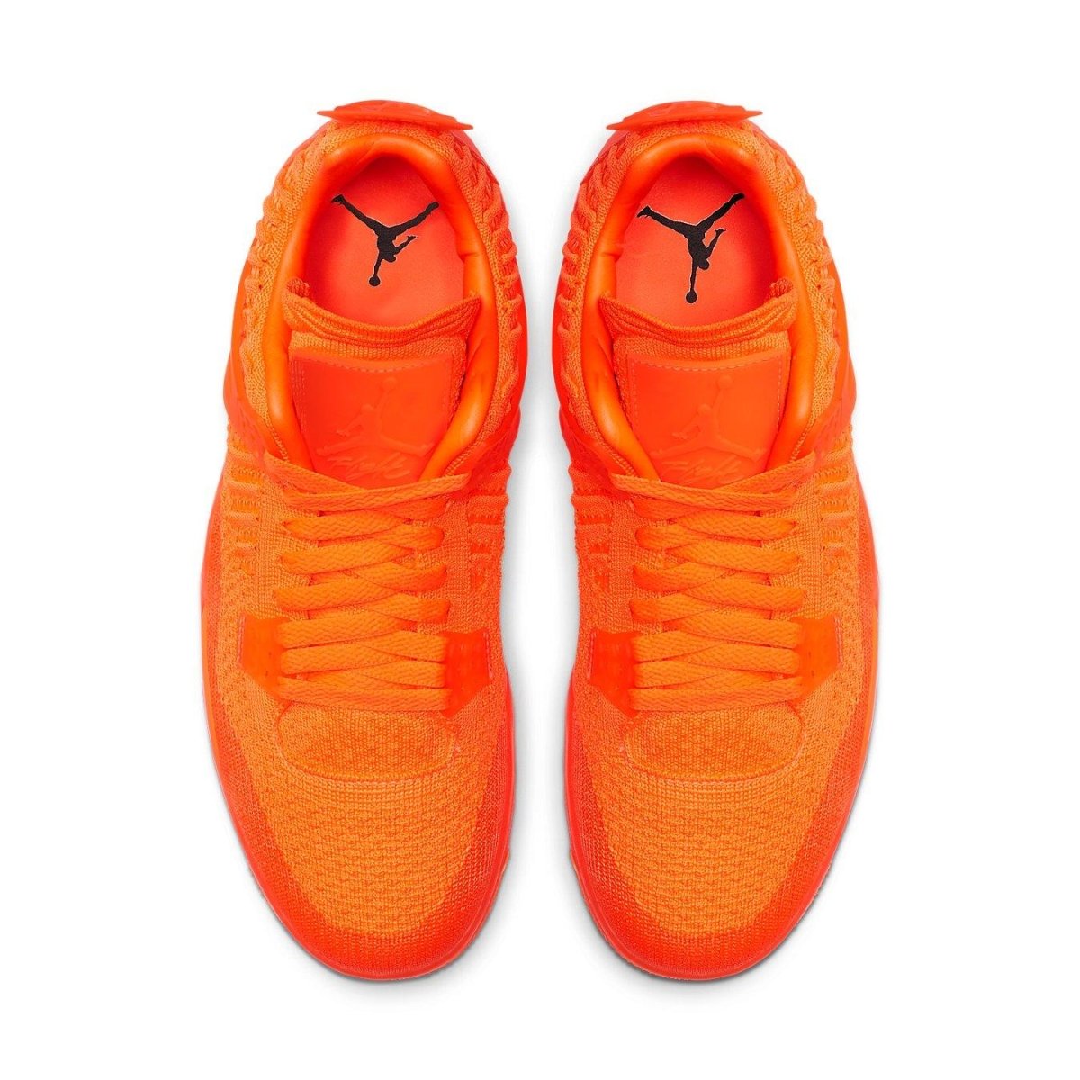 Air Jordan 4 Retro Flyknit in Total Orange, featuring a sleek Flyknit upper design.