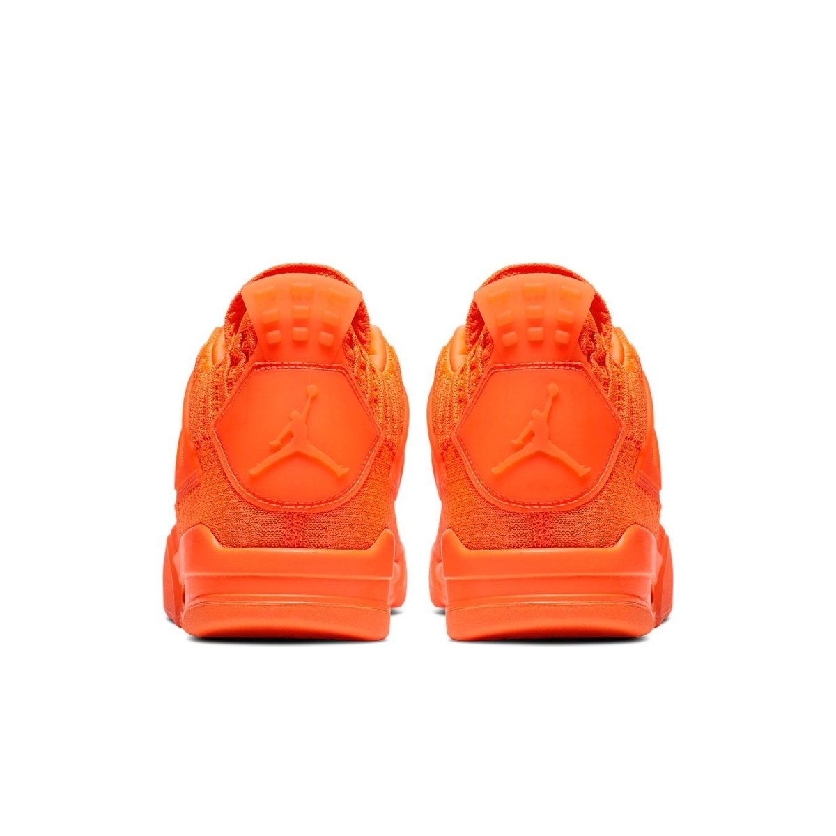 Back view of the Jordan 4 Retro Flyknit Orange sneakers showcasing the vibrant Total Orange color.
