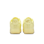 Back view of Nike Air Force 1 Low Drake NOCTA Certified Lover Boy in citron tint with co-branded logos.