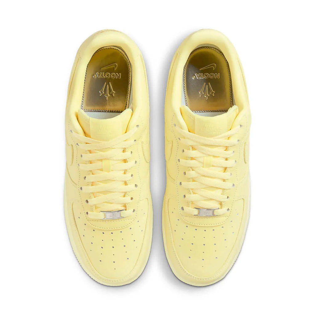 Nike Air Force 1 Low Drake NOCTA in Citron Tint with premium leather upper and co-branded details.
