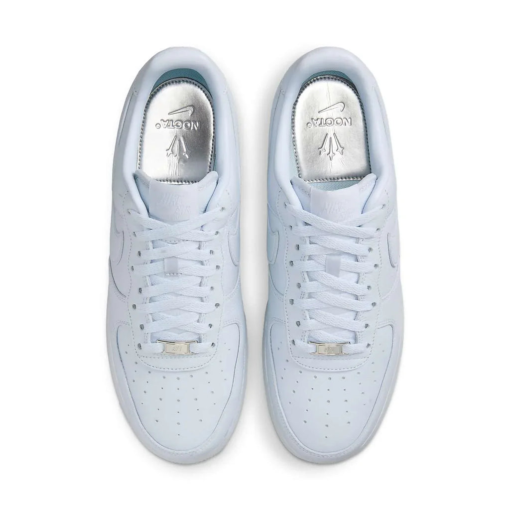 Nike Air Force 1 Low Drake NOCTA in pastel purple with minimalist design and iconic Swoosh details.