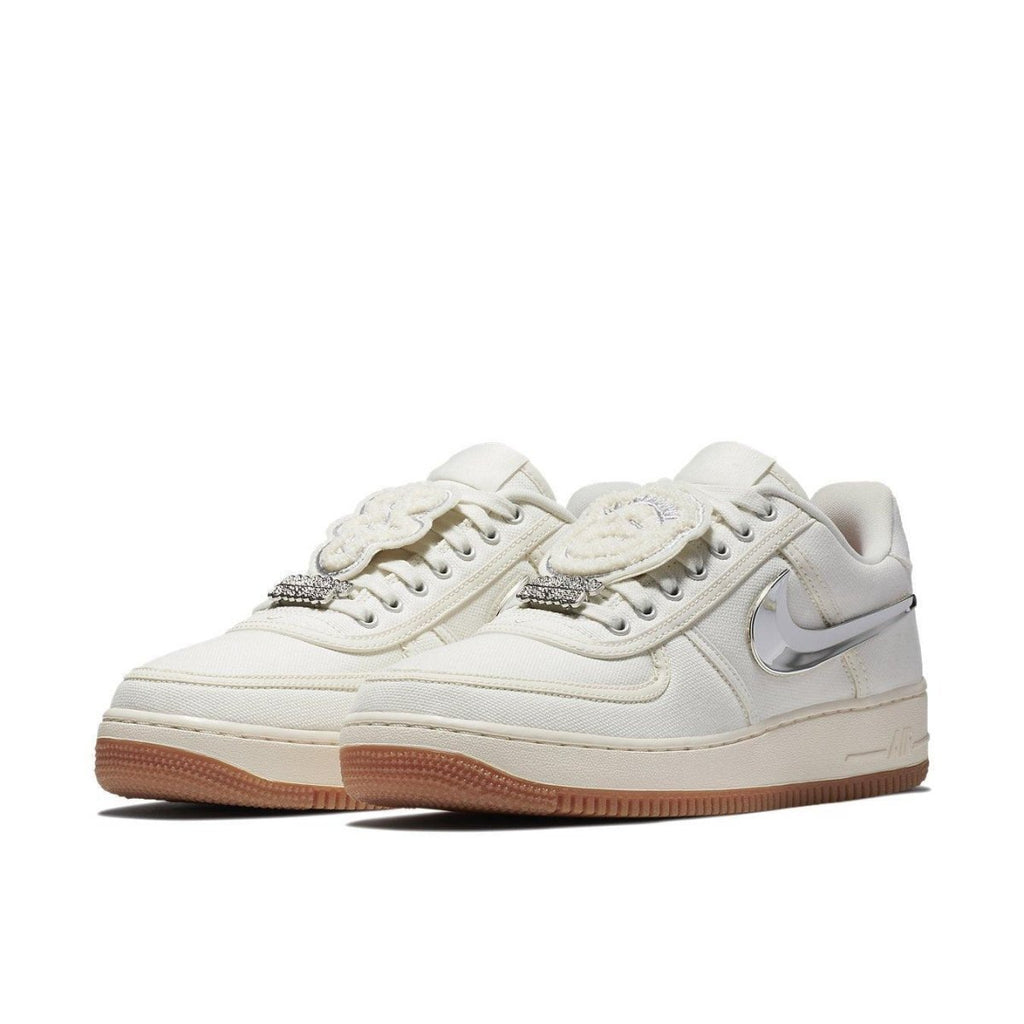 Nike Air Force 1 Low Travis Scott Sail with removable Swoosh and diamond details on laces, stylish white and gum sole.