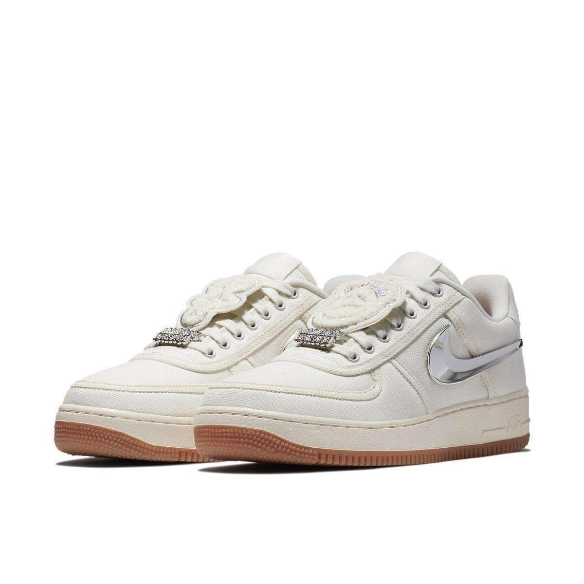 Nike Air Force 1 Low Travis Scott Sail with removable Swoosh and diamond details on laces, stylish white and gum sole.