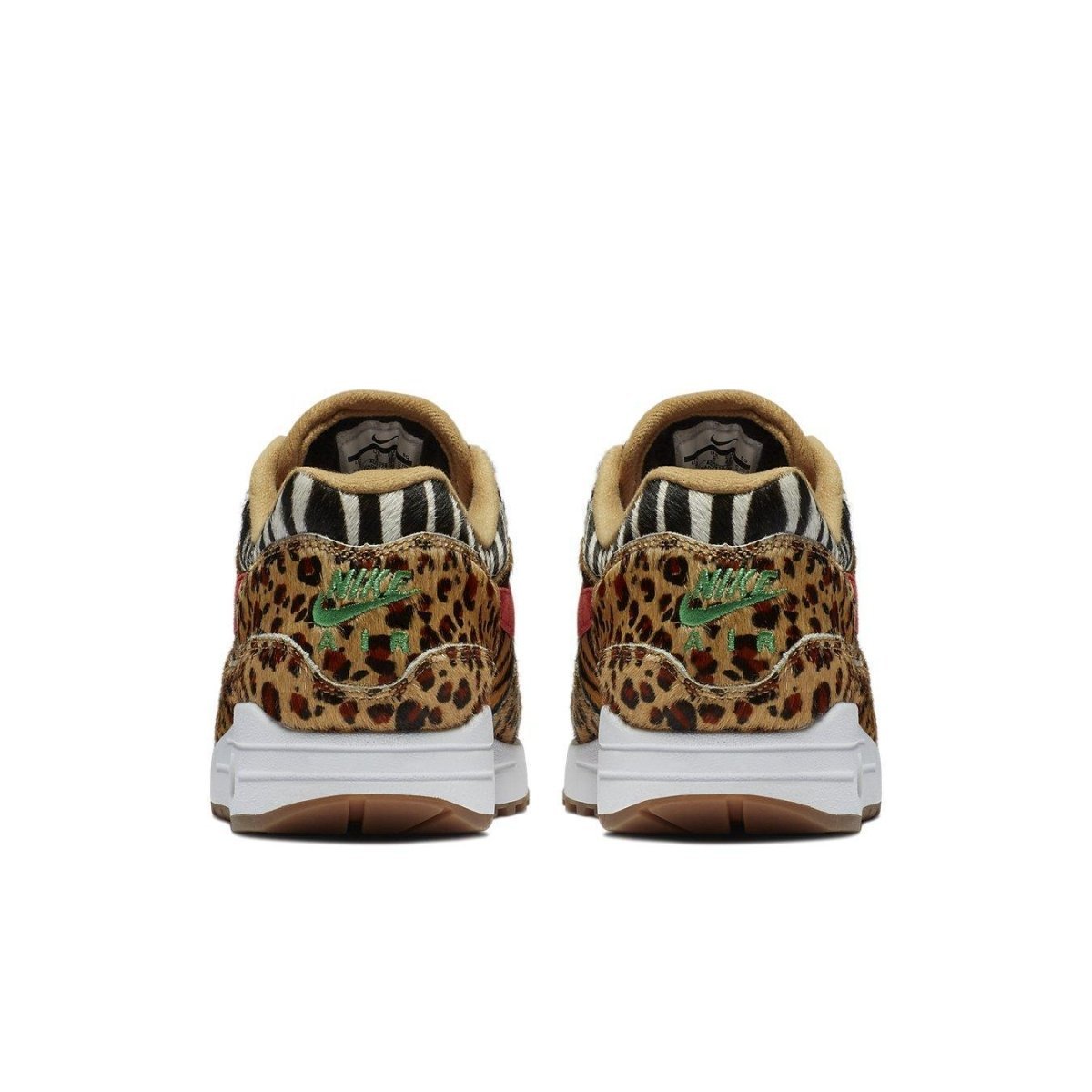 Nike Air Max 1 Atmos Animal Pack 2.0 shoes featuring leopard and zebra patterns from the back view.