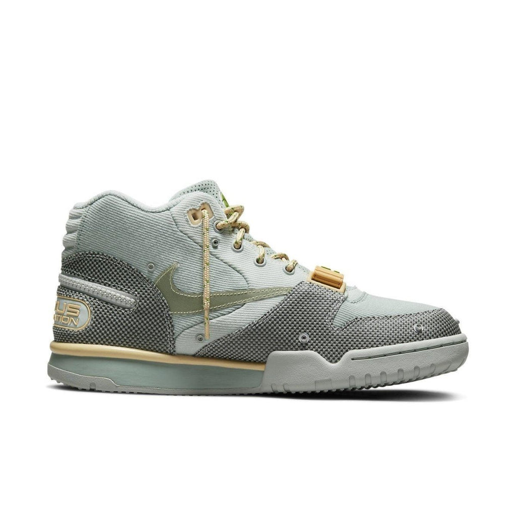 Nike Air Trainer 1 SP Travis Scott in Grey Haze, featuring corduroy and mesh design with gold accents.