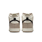 Nike Dunk High Fossil Stone women's shoes, showing the back view with beige and ivory leather design.