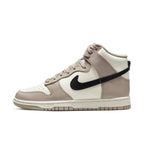 Nike Dunk High Fossil Stone women's sneakers in ivory and beige with black Swoosh detail.
