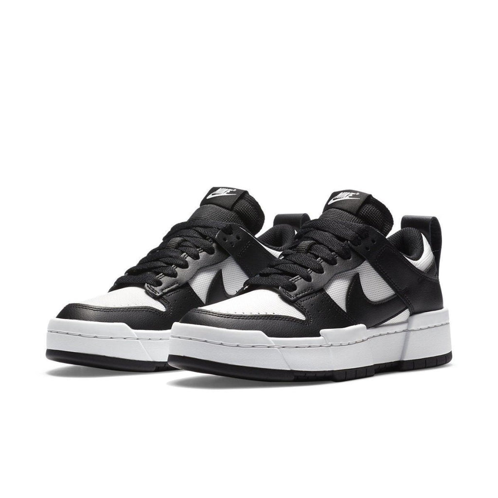 Nike Dunk Low Disrupt Black White for women, featuring a modern silhouette with platform design and exaggerated details.