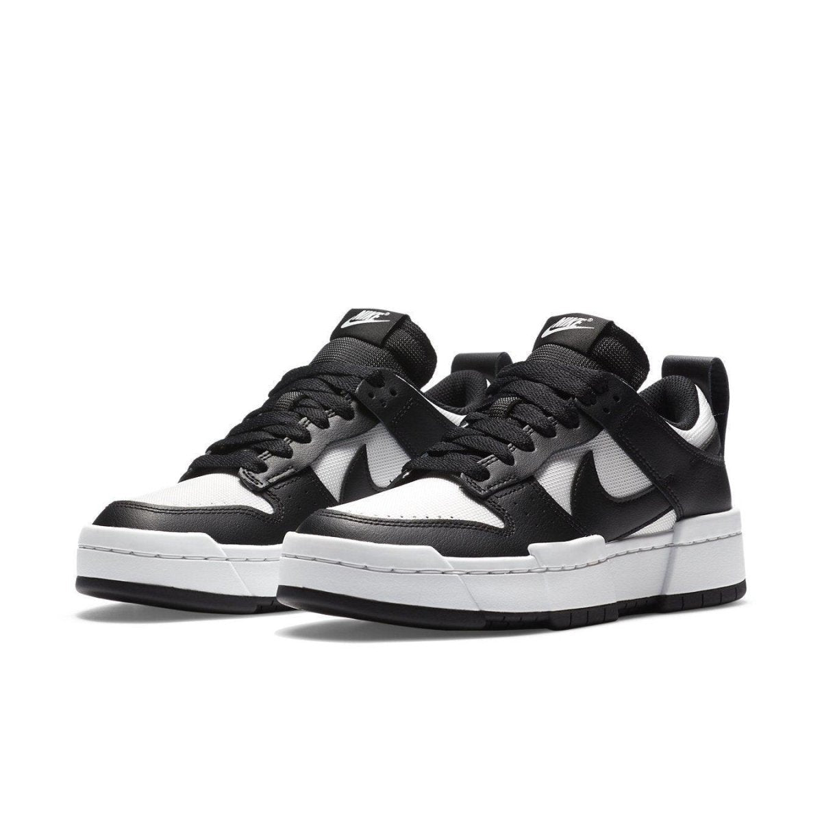 Nike Dunk Low Disrupt Black White for women, featuring a modern silhouette with platform design and exaggerated details.