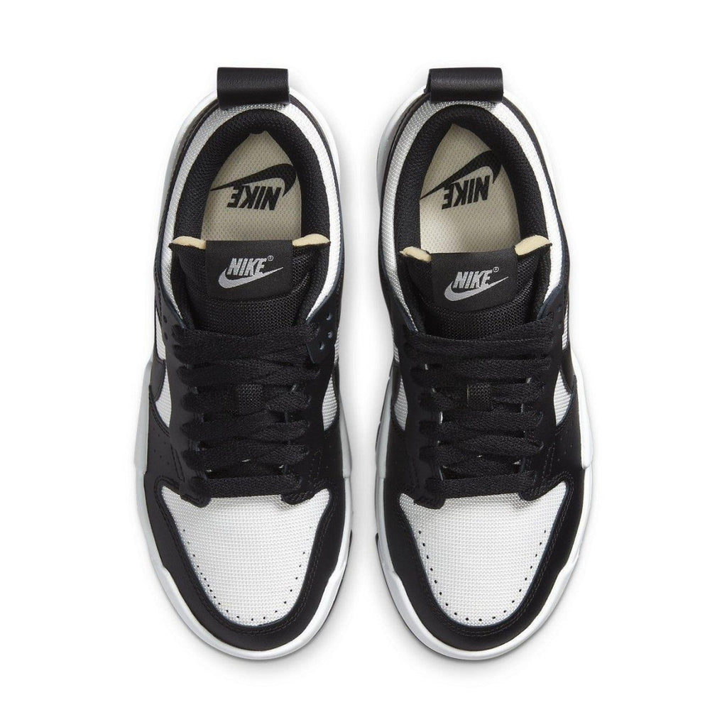 Nike Dunk Low Disrupt Black White women's sneaker overhead view with a modern design.