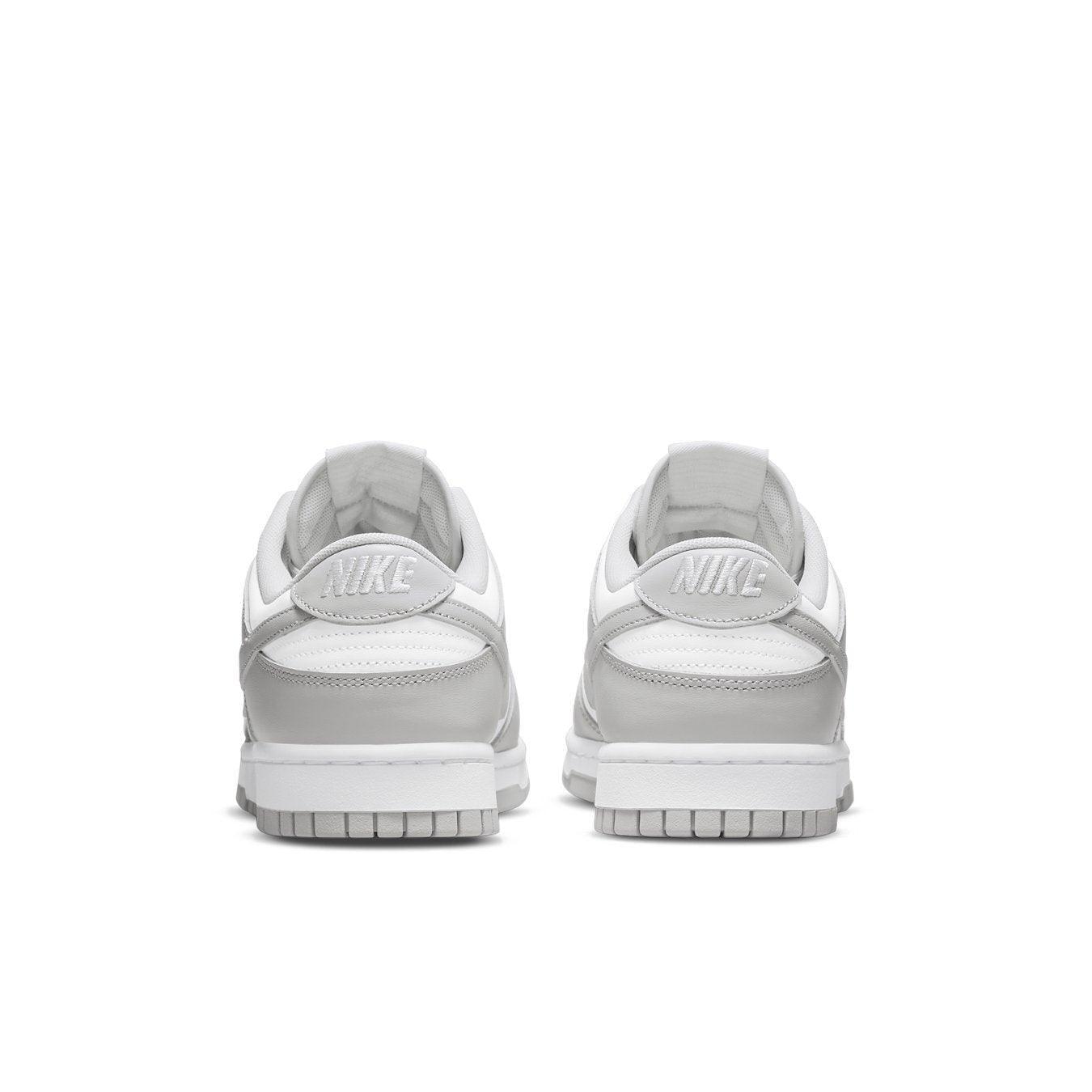 Nike Dunk Low Grey Fog sneaker rear view featuring grey and white leather design.