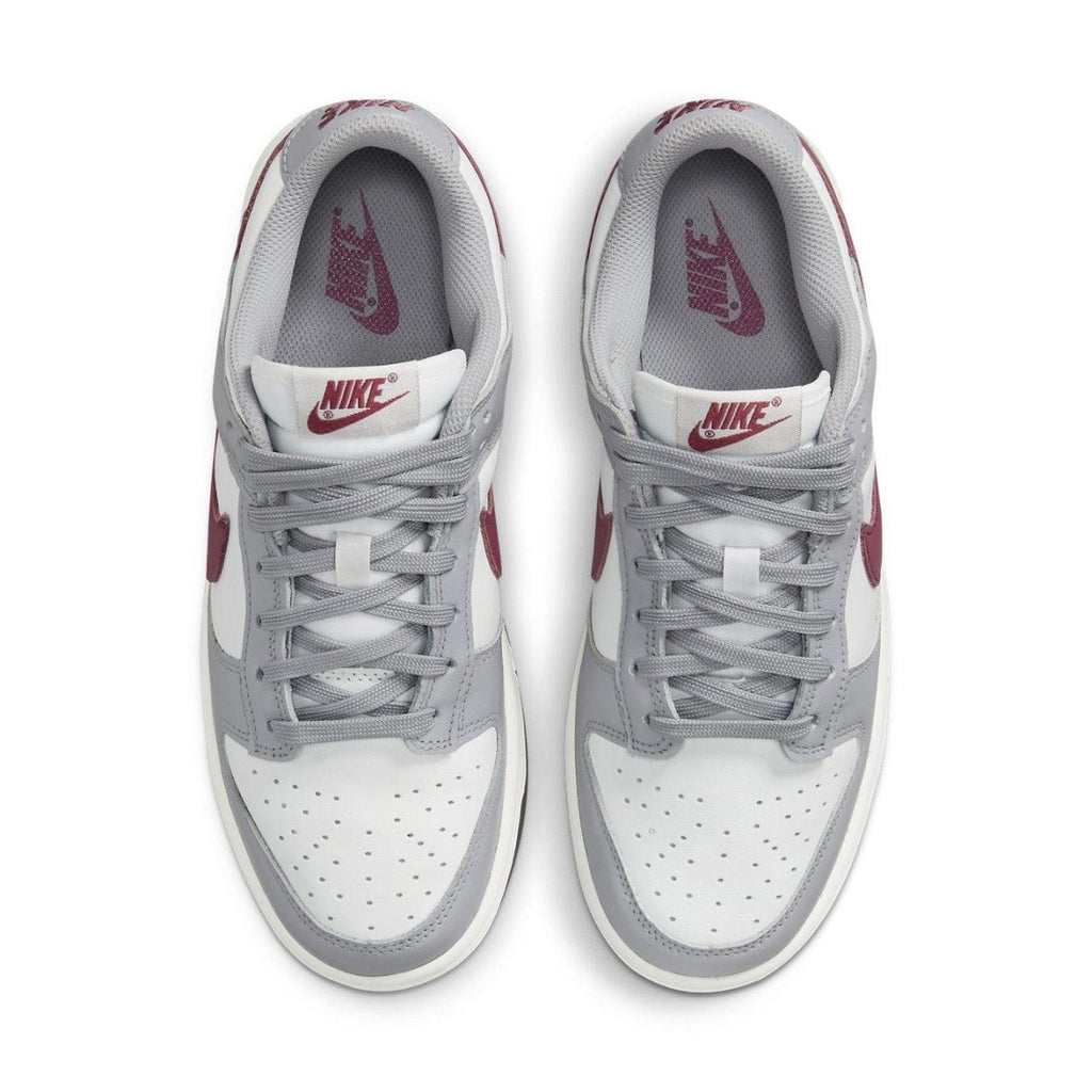 Nike Dunk Low Pale Ivory Redwood sneakers featuring white leather, gray accents, and luxurious Bordeaux details.