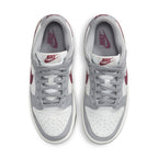 Nike Dunk Low Pale Ivory Redwood sneakers featuring white leather, gray accents, and luxurious Bordeaux details.