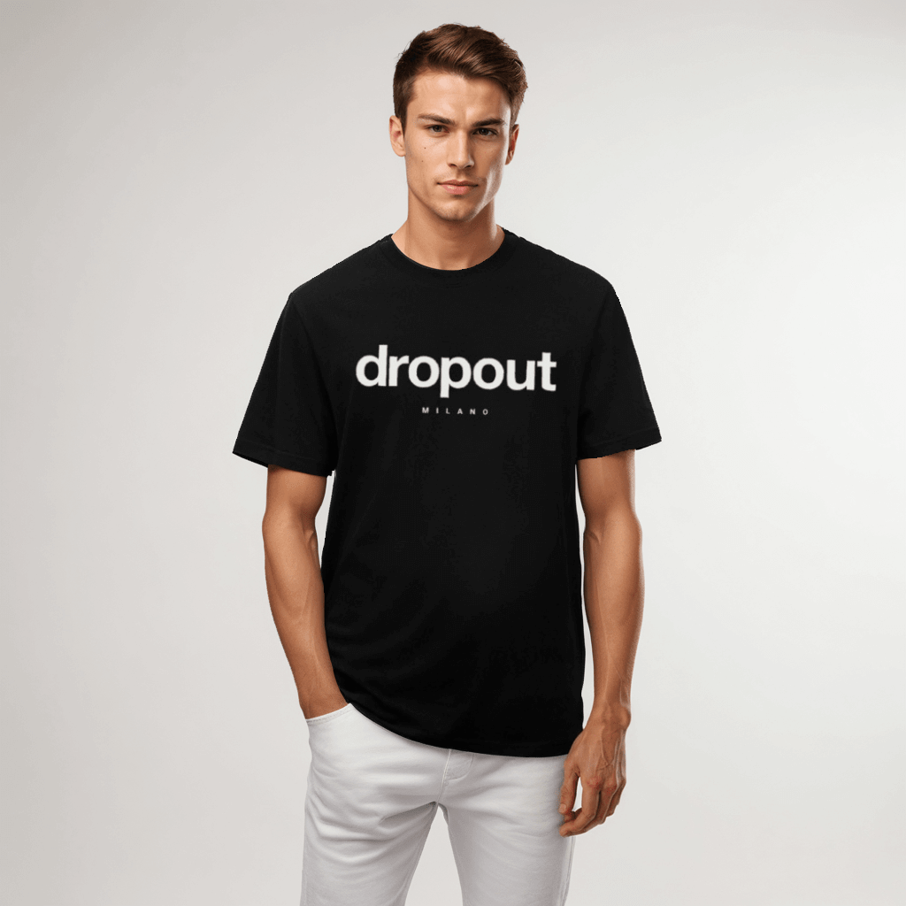 Model wearing a relaxed fit black tee with 'dropout' logo, showcasing casual comfort and stylish design.