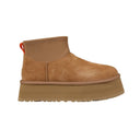 Brown suede platform boot on a white background