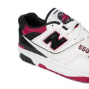 White sneaker with black and red accents on a white background