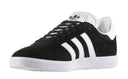 Black Adidas sneaker with white stripes on a white background