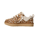 Leopard print sneaker with beige sole on a white background