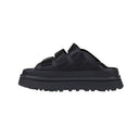 Black sandal with thick sole on a white background